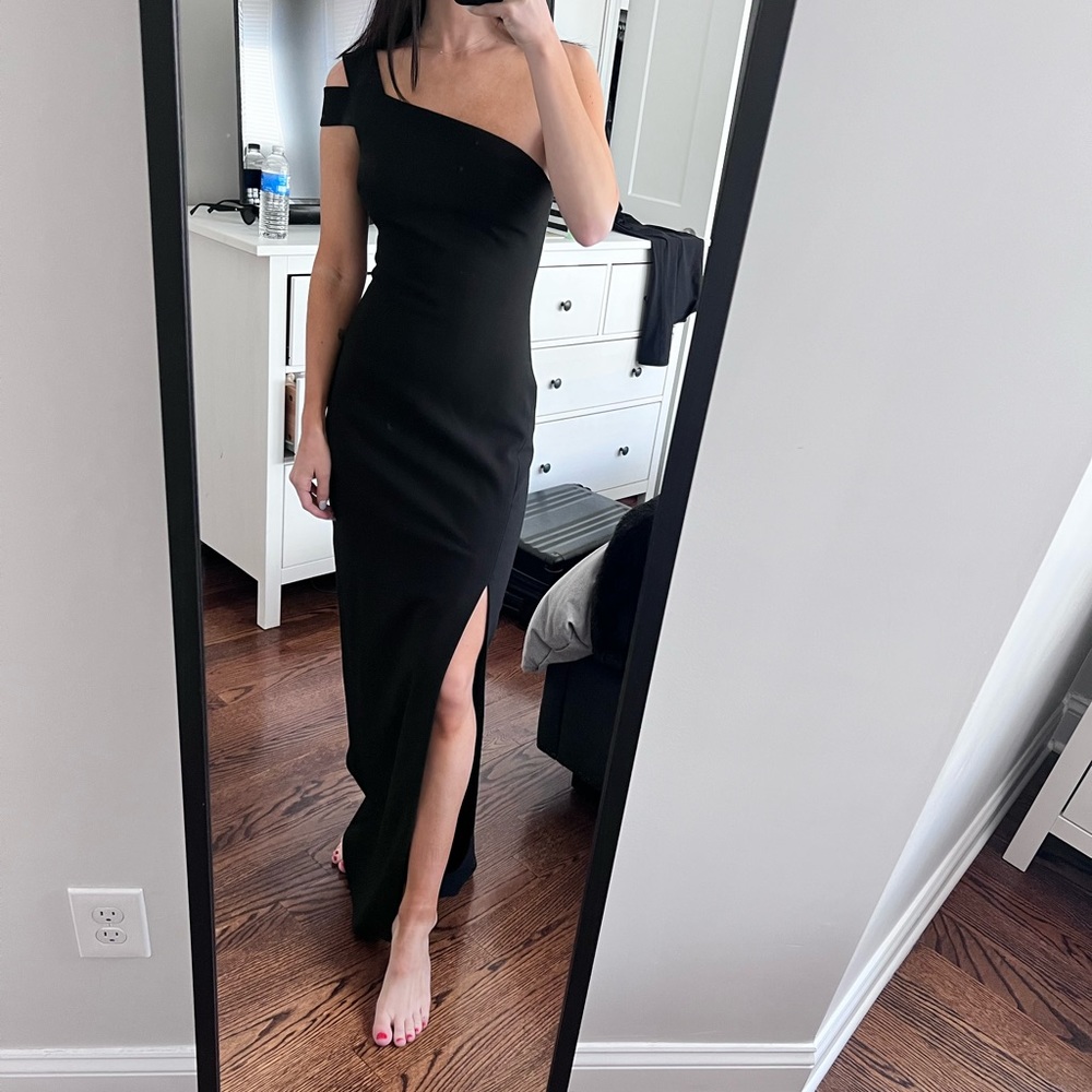 Black floor length Likely gown